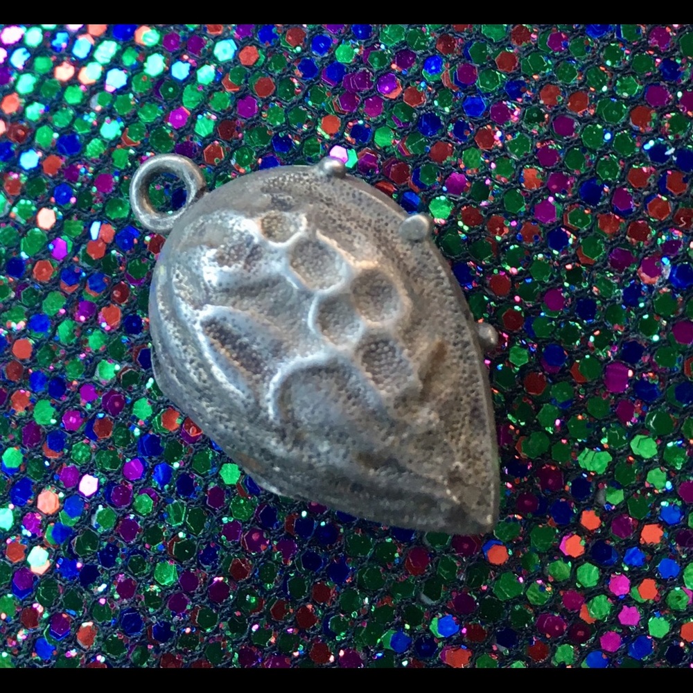 Antique, sterling  locket/ charm.